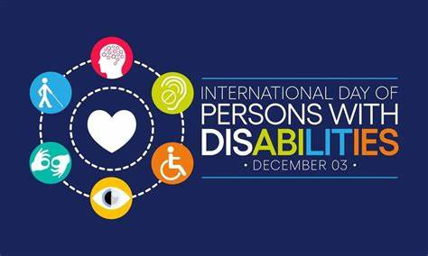 White text reads, International Day of Persons with Disabilities December 03, with various colors for the section of word abilities on a dark blue background.  An image of a white heart is surrounded by a circle with pictures of a brain, an ear with a line through, a wheelchair, an eye, two hands doing sign and a person with a cane.