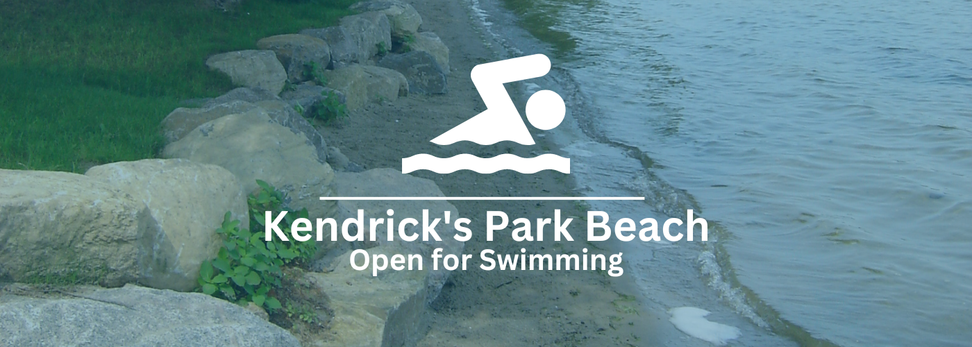 image of swimmer on water with caption Kendrick's Park Beach Open